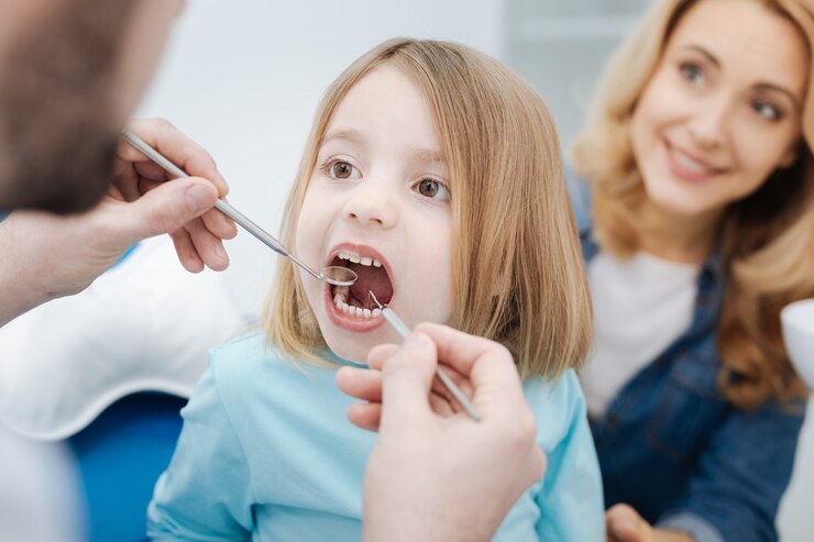 How a Family Dentist Can Grow with Your Child: From First Tooth to Teen Years